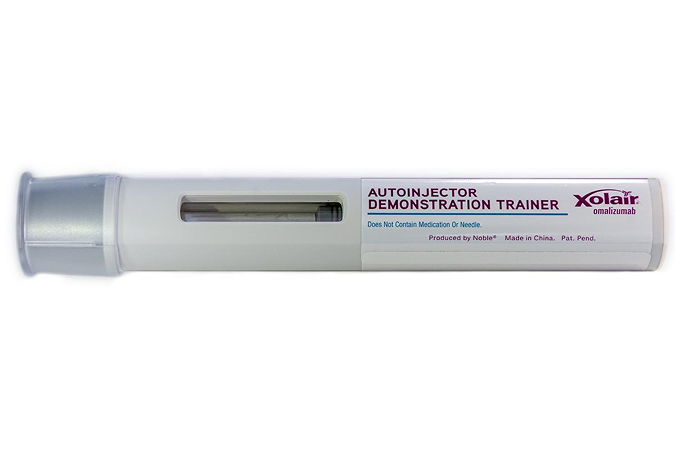 demonstration_autoinjektor_xolair_omalizumab_675x450.png Demonstrationsexemplar av Xolair autoinjektor