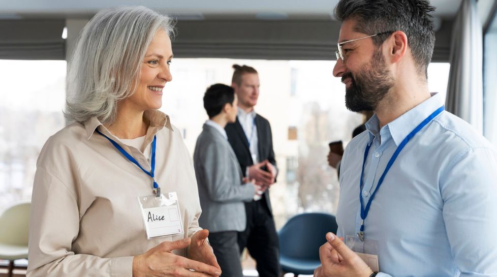 DAK Event Banner DAK Event Banner Two HCPs talking