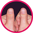 Circular image of a person's thumbs. Circular image of a person's thumbs.