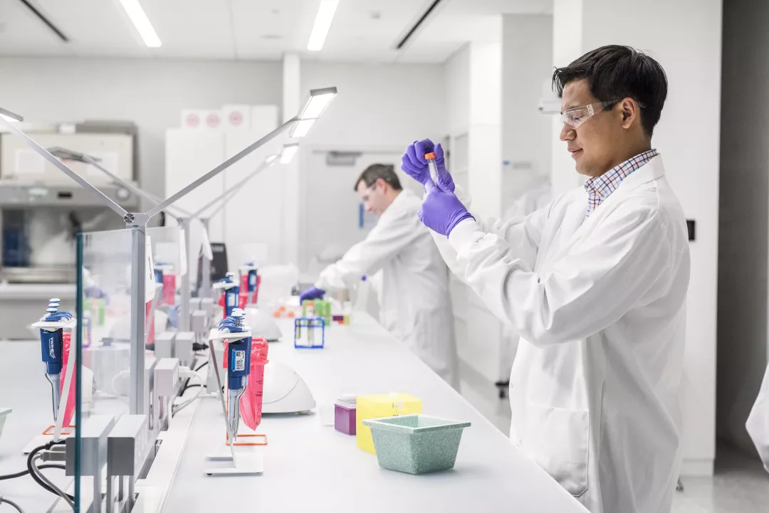 Clinical trials page header showing an image of scientists in a lab.